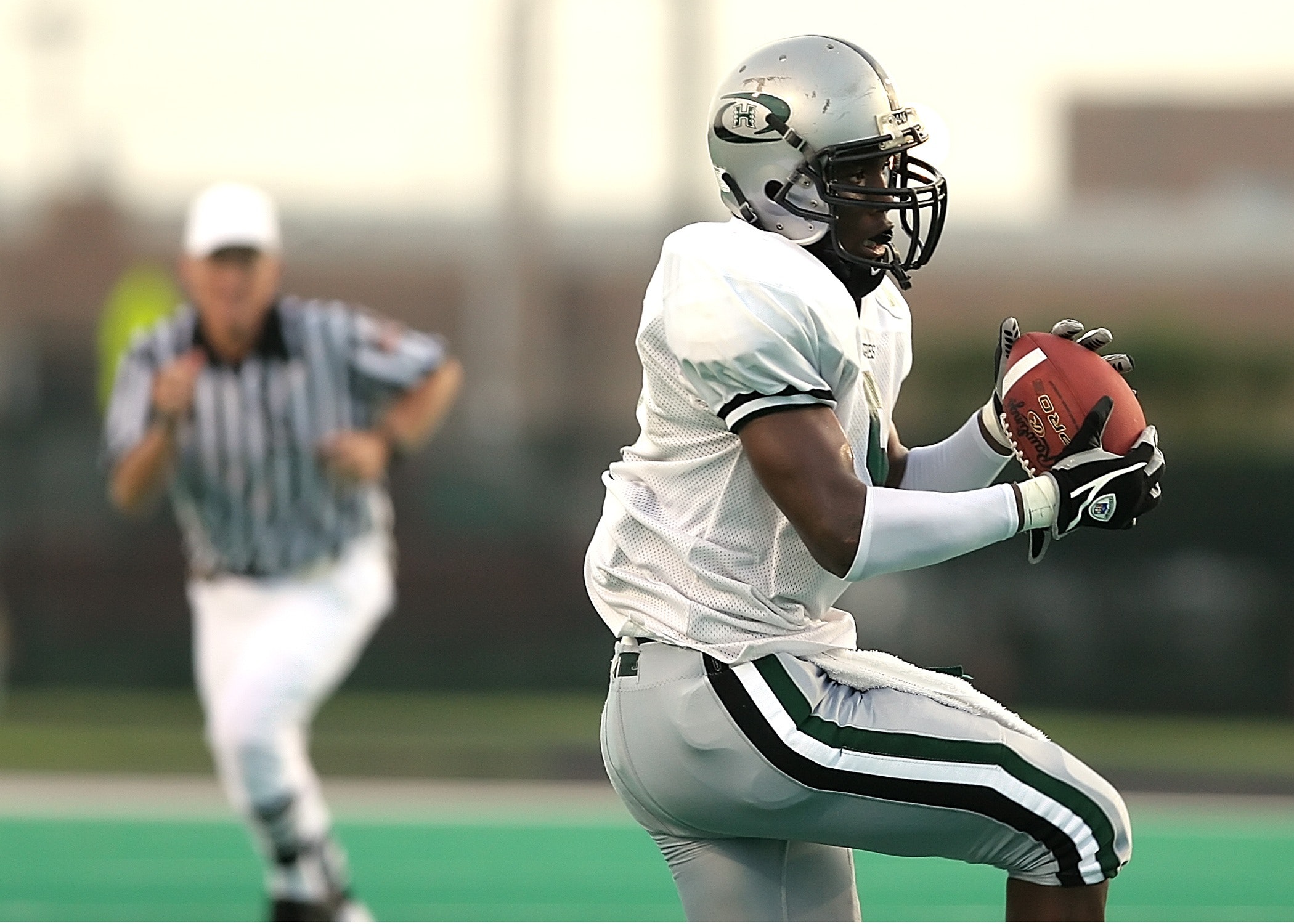 Football player with referee